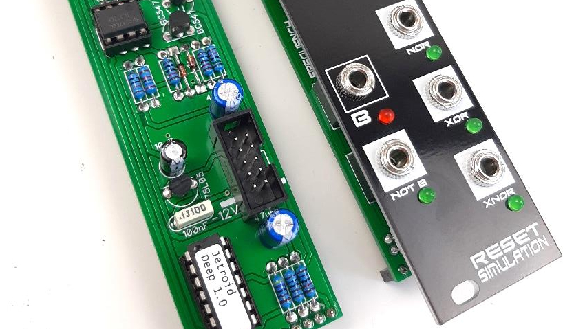 Closeup of an assembled Frequency Central Reset Simulation and associated logic board.